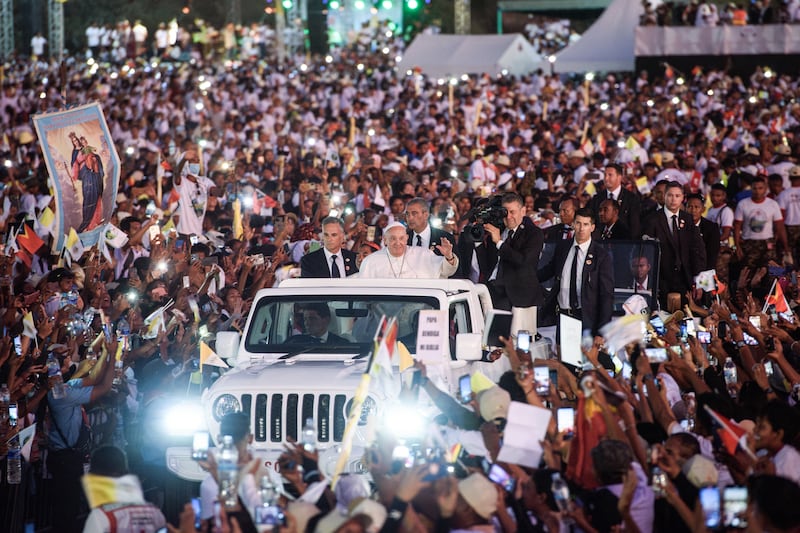 Pope Francis waves to Catholic faithful after leading Mass at the Esplanade of Tasitolu in Dili, East Timor on Tuesday. Photograph: Valentino Dariell De Sousa/AFP via Getty