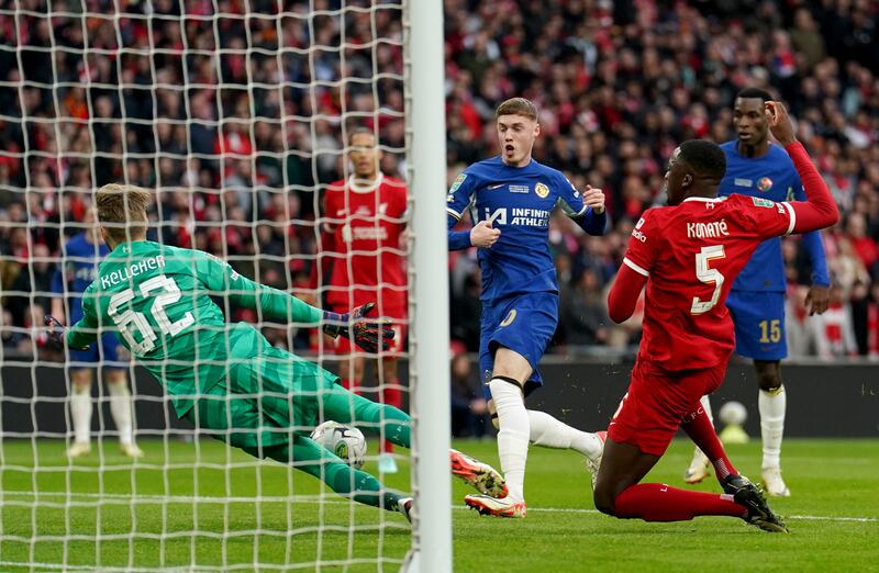 Liverpool goalkeeper Caoimhin Kelleher saves a shot from Chelsea's Cole Palmer. Photograph: Adam Davy/PA Wire