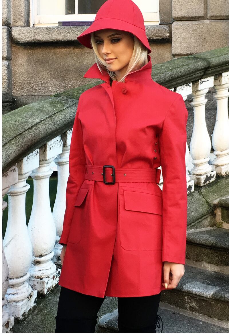 Red mac and hat, €719 and €69 respectively, from Francis Campelli