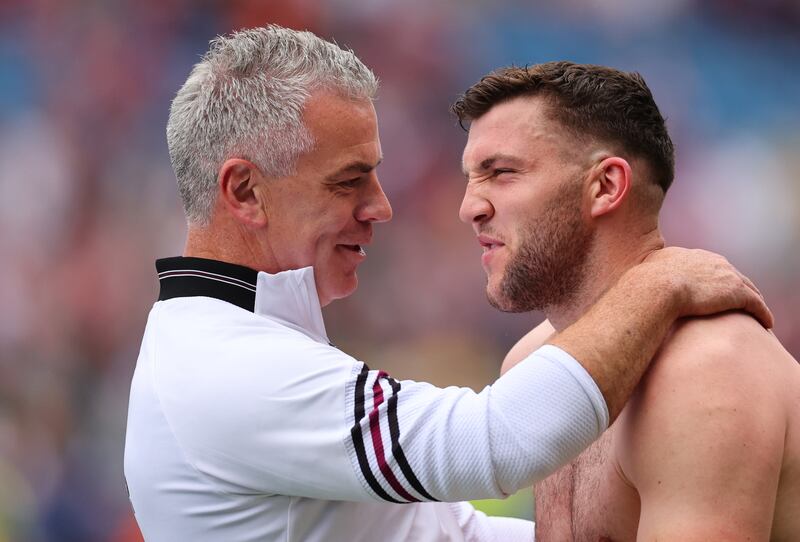 Galway’s manager Pádraic Joyce celebrates with Damien Comer. Photograph: James Crombie/Inpho