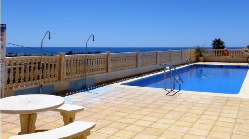 This Spanish house in Murcia is being sold with furniture.