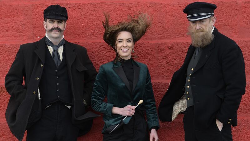 Cast members of The Lighthouse Ben McAteer (baritone) and John Molloy (bass) with the opera’s conductor, Elaine Kelly. Photograph: Clodagh Kilcoyne