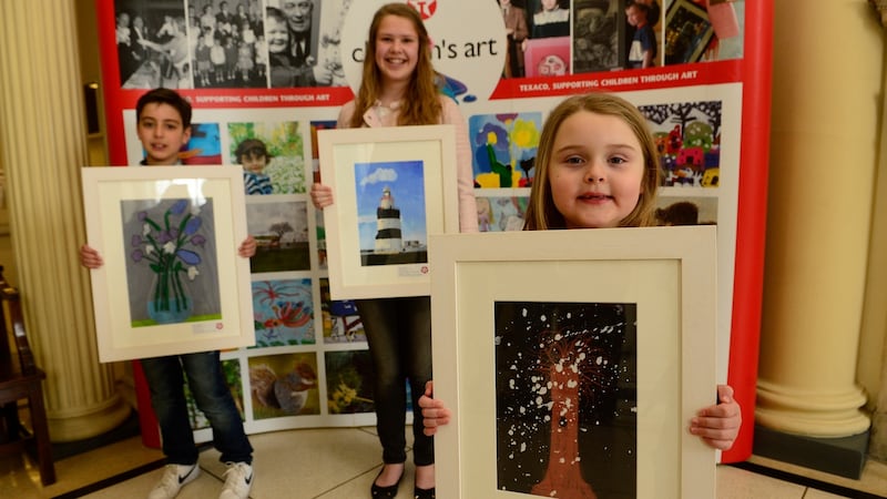 Winners in the Texaco Children’s Art Competition  2016 at the Hugh Lane Gallery in Dublin - from left, Ryan Bouakkaz from Santry;   Tara Watson of  Dún Laoghaire,   and Bonnie Sheppard from Belfast. Photograph: Cyril Byrne/The Irish Times