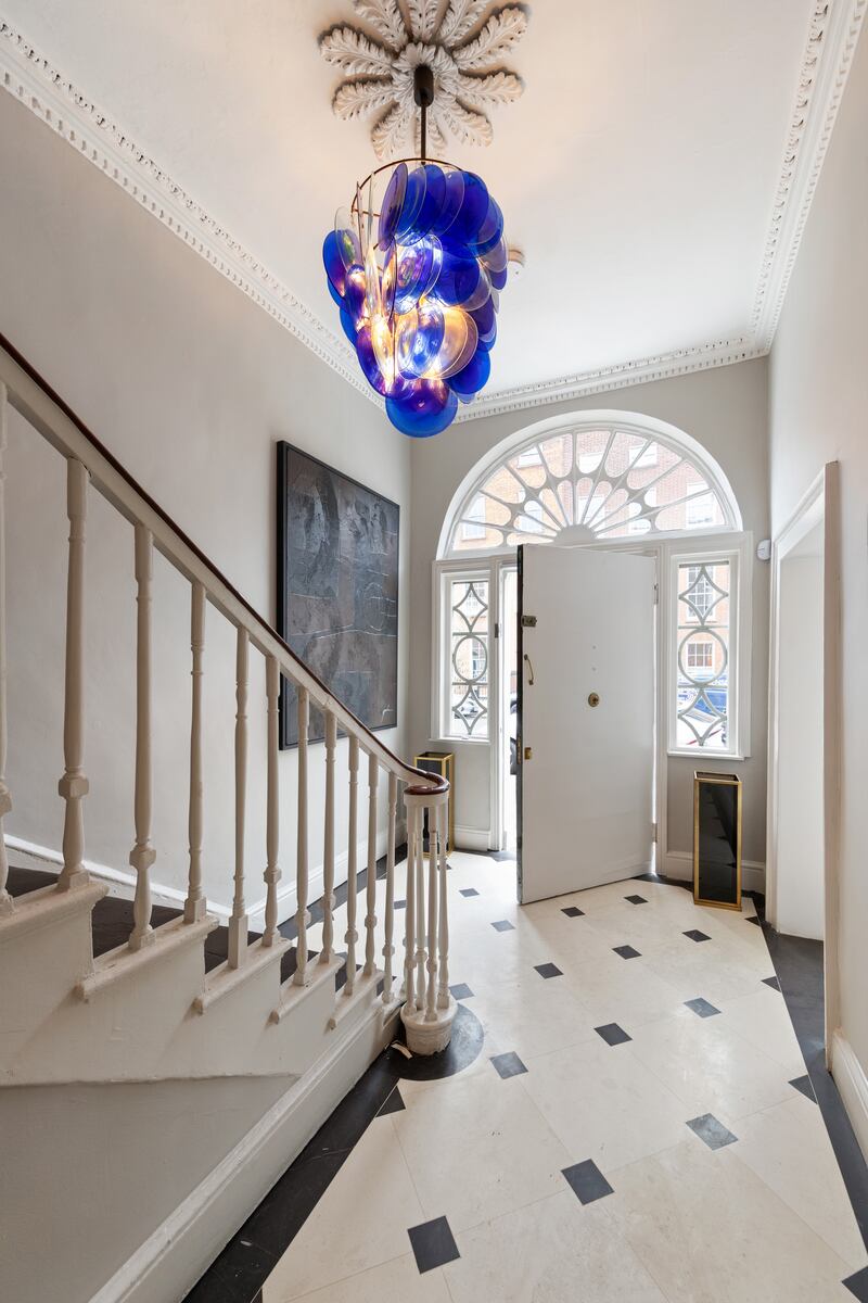 The property has an impressive cobweb fanlight