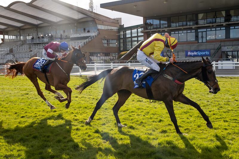 Ricky Doyle onboard Freewheelin Dylan comes home to win ahead of Jack Kennedy on Run Wild Fred in 2021. Dermot McLoughlin's charge  became the biggest-priced Irish National winner ever at 150-1. Photograph: Morgan Treacy/Inpho 