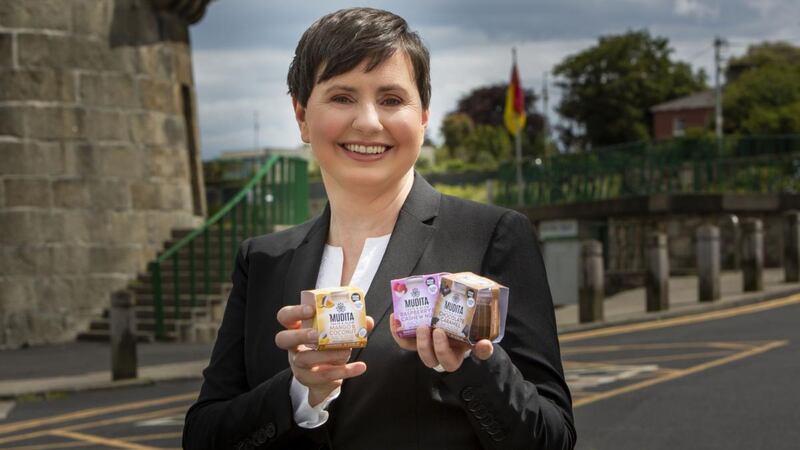Andrea McNamara, founder of Mudita, with some of the company’s range of vegan dessert products.