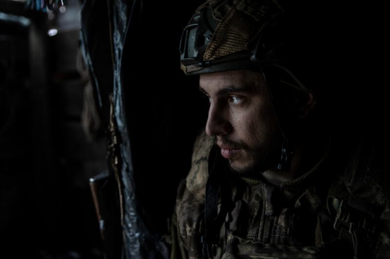 A Ukrainian soldier with the 79th Air Assault Brigade waits in a bunker along the front line in an area of Marinka, in eastern Ukraine. Photograph: Tyler Hicks/New York Times