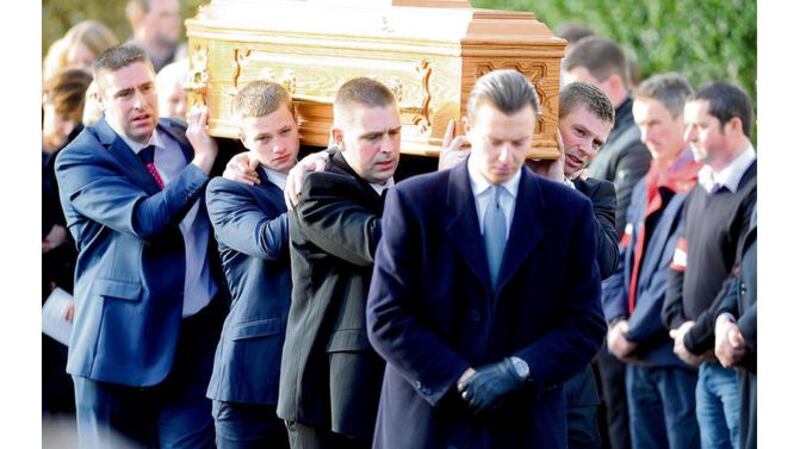 The remains of the Kerry legend are carried by his son Pádraig Óg, and nephews Fergal, Tomás, Darragh and Marc at the funeral in Ventry, Co Kerry, in December last year. Photograph: Inpho