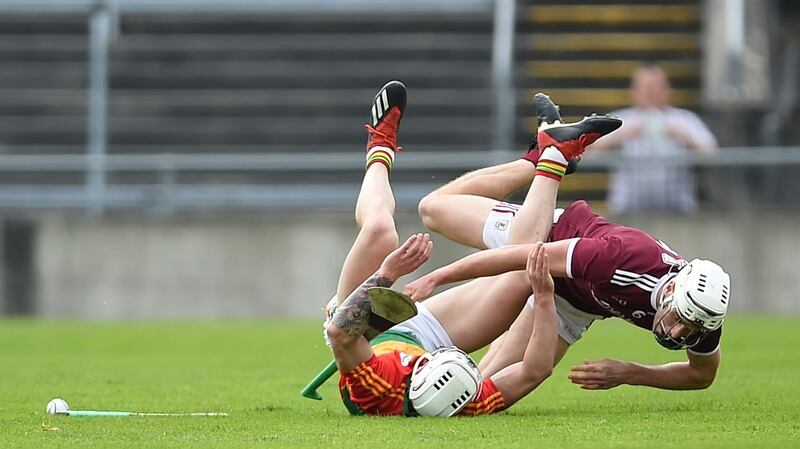 Carlow’s James Doyle and Gearoid McInerney of Galway collide. Photograph: Tommy Grealy/Inpho