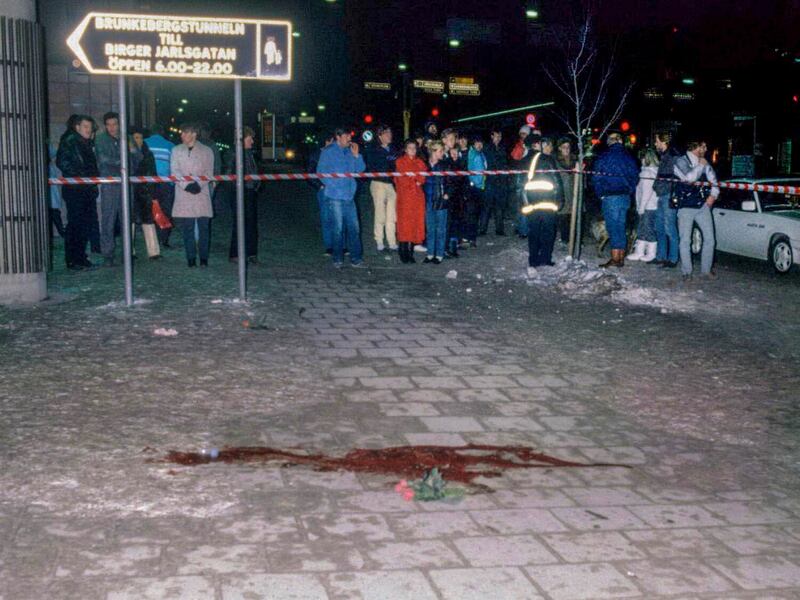 A pool of blood and flowers mark  the spot where Olof Palme was assassinated in Stockholm on March 1st, 1986.  Photograph: Bjorn Elgstrand/EPA