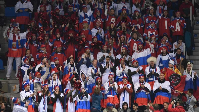 Russian fans attend the figure skating at the Gangneung Ice Arena. Photo: Roberto Schmidt/Getty Images