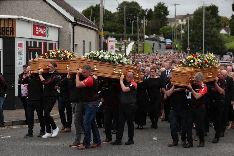 The coffins of shooting victims Vanessa Whyte and her children Sara and James Rutledge. Photograph: Liam McBurney/PA Wire