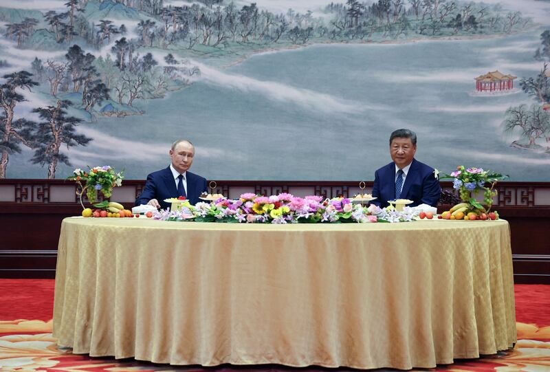 Russia's president Vladimir Putin and China's president Xi Jinping attend a meeting at The Great Hall of the People in Beijing. Photograph: Alexander Kazakov/ Pool/ AFP via Getty Images