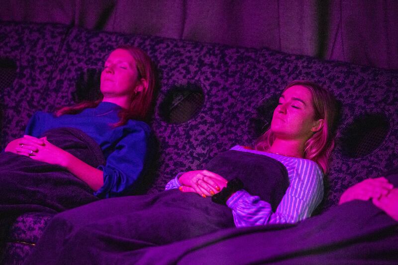 Participants during an immersive experience with light and sound in the Dreamachine. Photograph: Liam McBurney/PA 