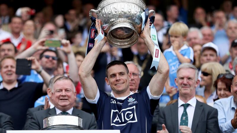 Stephen Cluxton lifts the Delaney Cup. Photograph: Tommy Dickson/Inpho