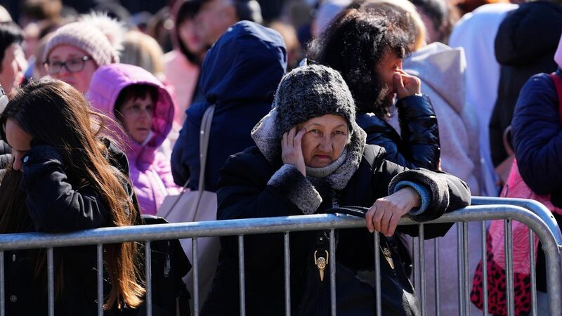 Ukrainian refugees line up to register in Warsaw. Photograph: Petr David Josek/AP
