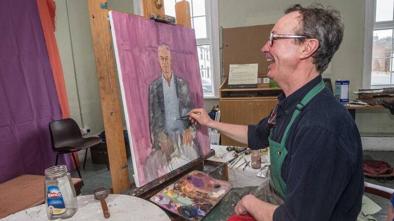 Mick O’Dea at work on his portrait of actor Barry McGovern