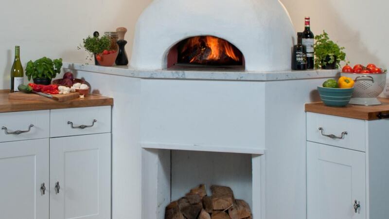 Valoriana wood fired pizza oven installed in a kitchen