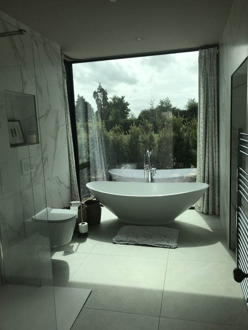 The refurbished Riverstown House has four bathrooms, including this one with a stylish freestanding bath.