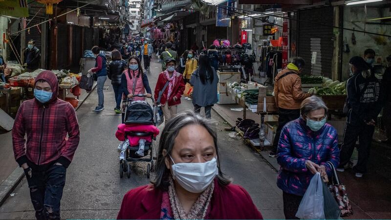 Shoppers wear face masks at a market on January 28th, 2020 in Macau, China, as the number of coronavirus cases in that country rose to 4.000.  Photograph: Anthony Kwan/Getty Images