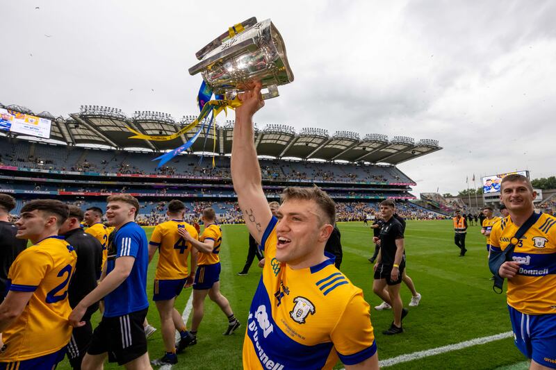 Clare’s Shane O'Donnell with the Liam McCarthy Cup held aloft after the Banner County's famous victory. Photograph: Morgan Treacy/Inpho