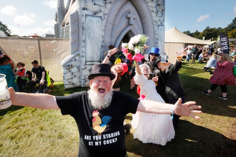 John Duck Egg Downey provider of costumes for Getting Married at the Inflatable Church with Sarah Byrne (maid of honour), Louise Byrne (bride), Cathal O’Brien (best man), Stephen Hennessy (groom) from Clare and Cork on the second day of Electric Picnic at Stradbally, Co Laois. Photograph: Alan Betson/The Irish Times