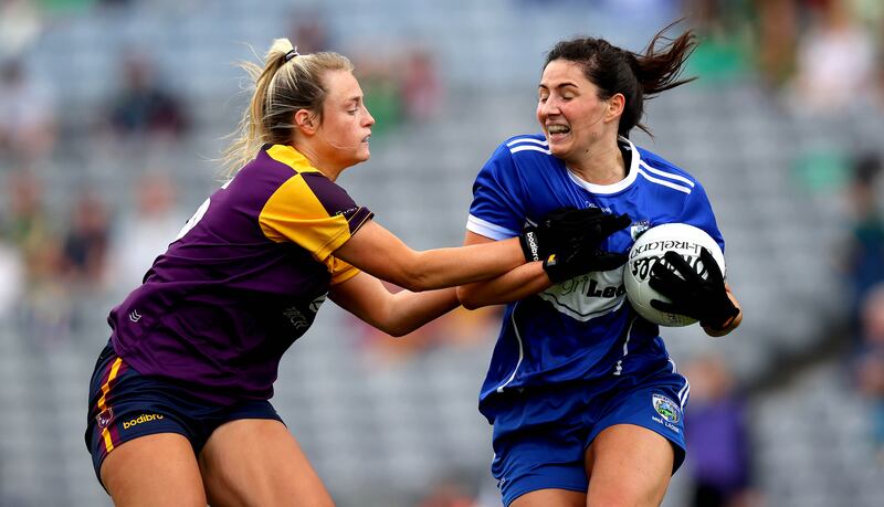 Laois’ Clodagh Dunne at close quarters with Amy Wilson of Wexford in the TG4 All-Ireland Ladies Football Intermediate Championship Final at Croke Park. Photograph: Ryan Byrne/Inpho