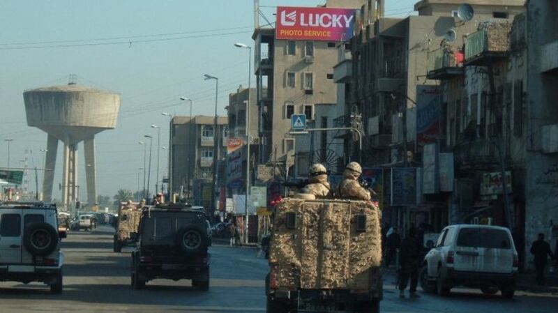 Mark McManus and a Royal Irish Regiment colleague on patrol in Baghdad city in 2005