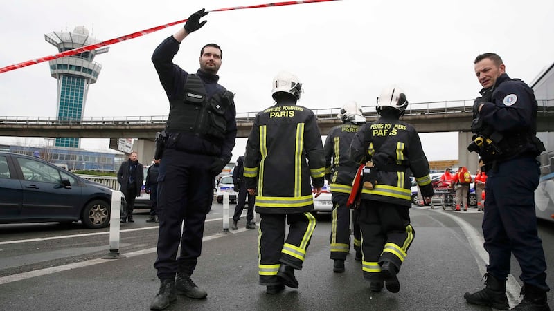 Emergency services arrive at Orly airport southern terminal in Paris on Saturday. Photograph: Reuters
