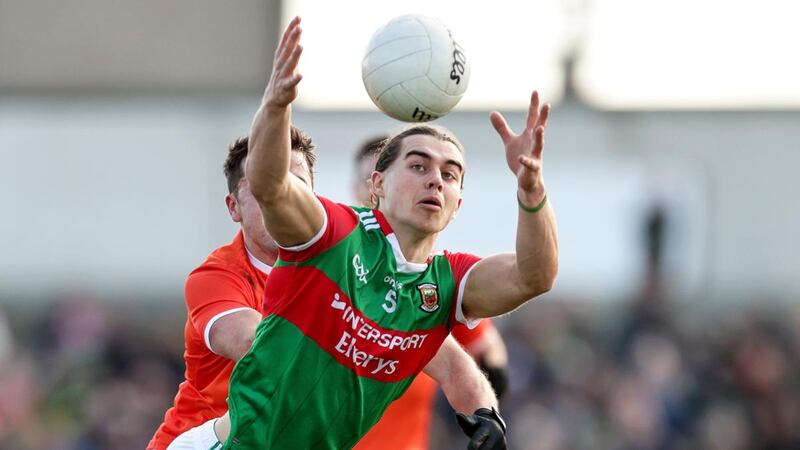 Mayo’s Oisín Mullin and Stefan Campbell of Armagh compete for the ball. Photograph: Laszlo Geczo/Inpho