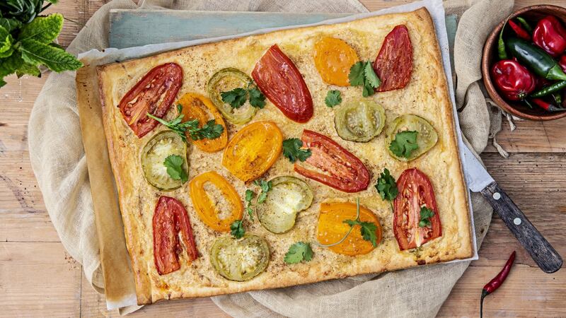 Spiced tomato tart with hummus and coriander. Photograph: Harry Weir