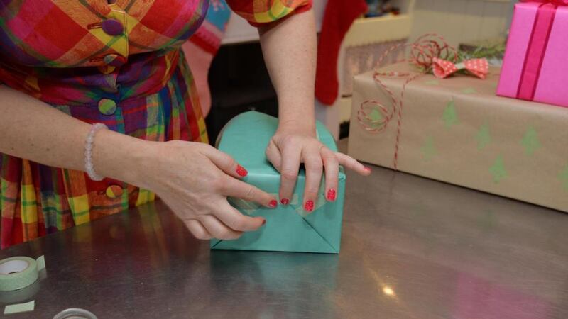 Step 6: Tape each piece down as you fold. Photograph: Alan Betson