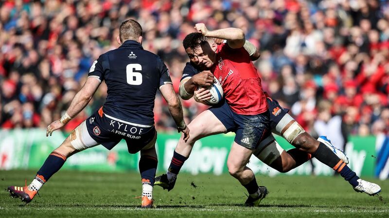 Munster’s Rory Scannell is tackled by Edinburgh’s Viliame Mata and John Barclay during the Heineken Champions Cup quarter-final at Murrayfield. Photograph: Dan Sheridan/Inpho