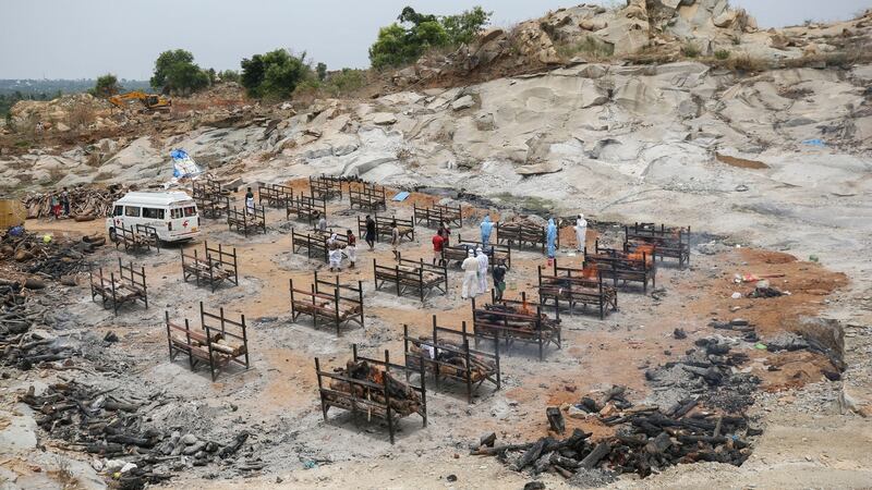 Bodies of people who died of Covid-19 are cremated at an open crematorium on the outskirts of Bengaluru, Karnataka state, India on Wednesday.  Photograph: Aijaz Rahi/AP