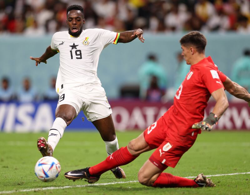 Sergio Rochet tackles Iñaki Williams during the FIFA World Cup Qatar 2022 Group H match between Ghana and Uruguay at Al Janoub Stadium in Al Wakrah, Qatar. Photograph: Elsa/Getty Images