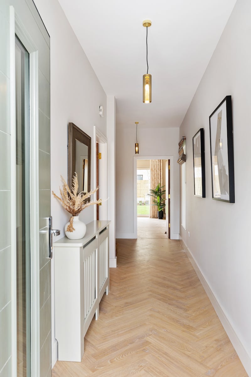 The entrance hall at the front of the property leads to the livingroom