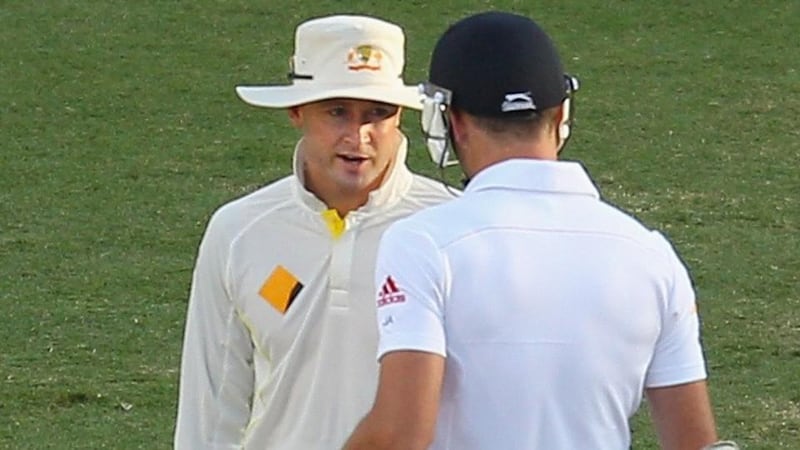 Michael Clarke of Australia and James Anderson of England exchange words during day four of the First Ashes Test  at The Gabba. Photograph:  Scott Barbour/Getty Images