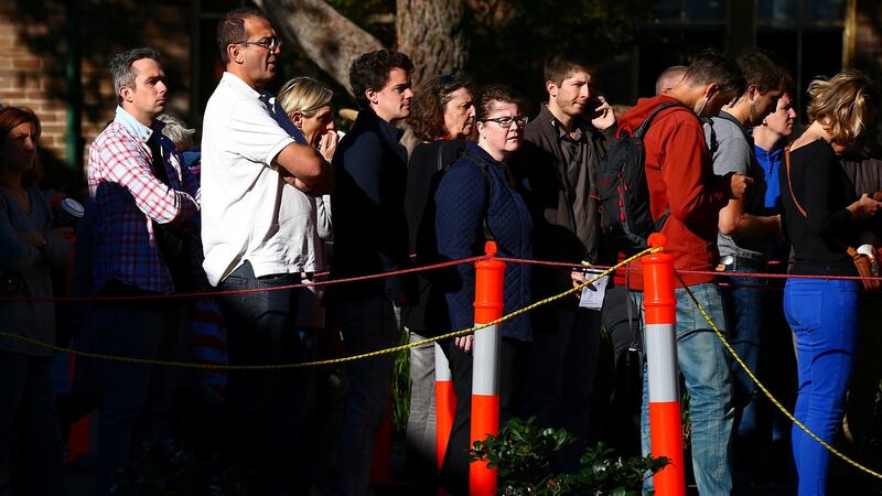 French nationals living in Australia  wait to cast their votes in the presidential poll  at a school in Sydney, Australia. Photograph: Reuters/David Gray