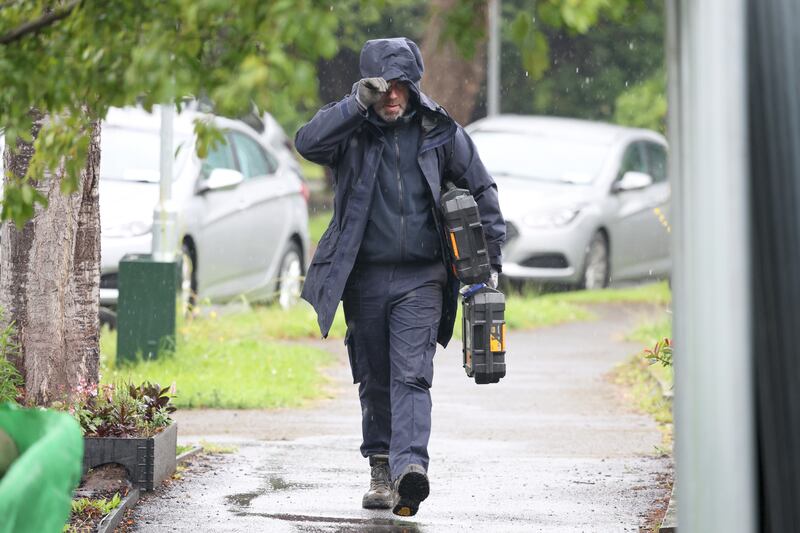 Garda arriving at the house in Clondalkin on Thursday morning. Photograph: Collins