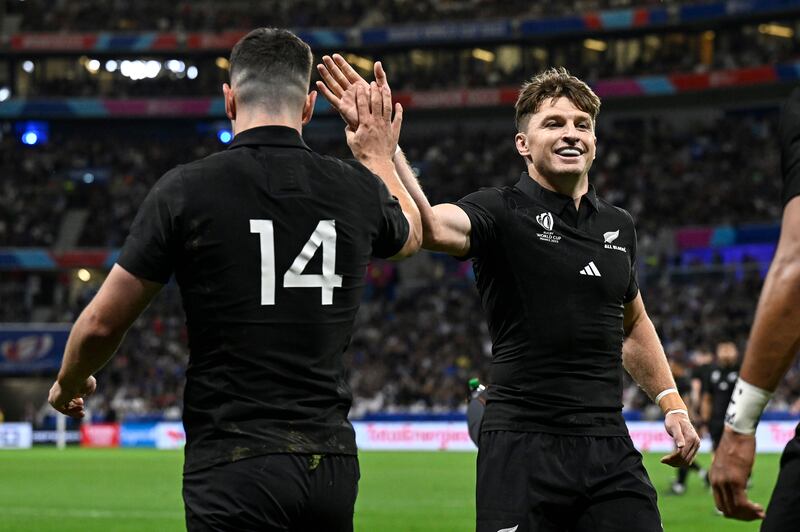 New Zealand’s Will Jordan celebrates scoring a try with Beauden Barrett during the Rugby World Cup victory over Italy at the OL Stadium, Lyon Photograph: Andrew Cornaga/Inpho