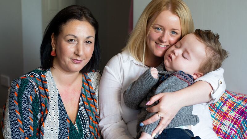 Kerrie Nelson and her son, James, with Jack and Jill nurse Naomi Jackson. ‘I call her the baby whisperer,’ says Kerrie.  Photograph: Tom Honan