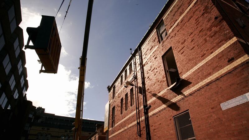A piano being delivered to the music school on Chatham Row, which may be sold. File photograph: Dara MacDonaill