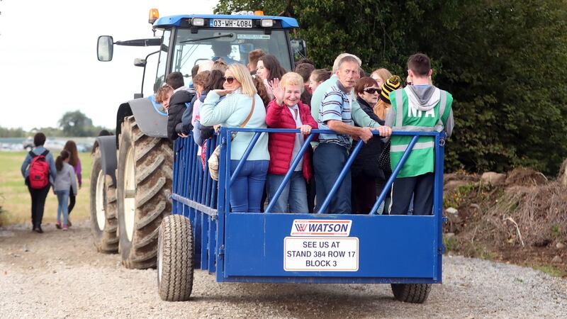 Patrons are ferried around the site by tractor at the National Ploughing Championships in Tullamore, Co Offaly. Photograph: Niall Carson/PA Wire