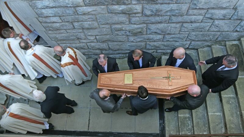 Nephews of former Bishop of Galway Eamonn Casey carry his remains to the crypt at Galway Cathedral. Photograph: Joe O’Shaughnessy.