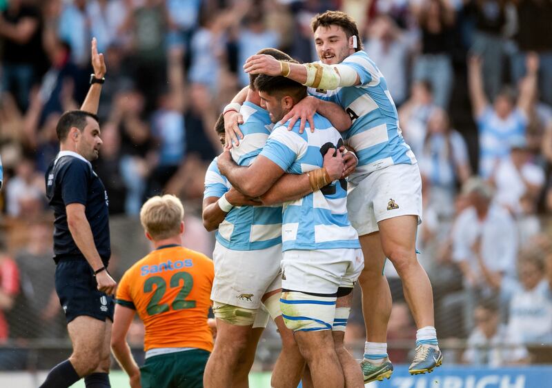 Joaquin Oviedo celebrates with his team-mates Mateo Carreras and flanker Marcos Kremer after scoring a try during the Rugby Championship match between Argentina and Australia. Photograph: Geronimo Uranga/AFP via Getty Images