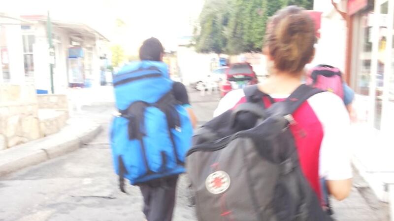 The family walking in Bodrum, Turkey: Jamil (left), Carla and Leila (with backpack): Photograph: Lora
