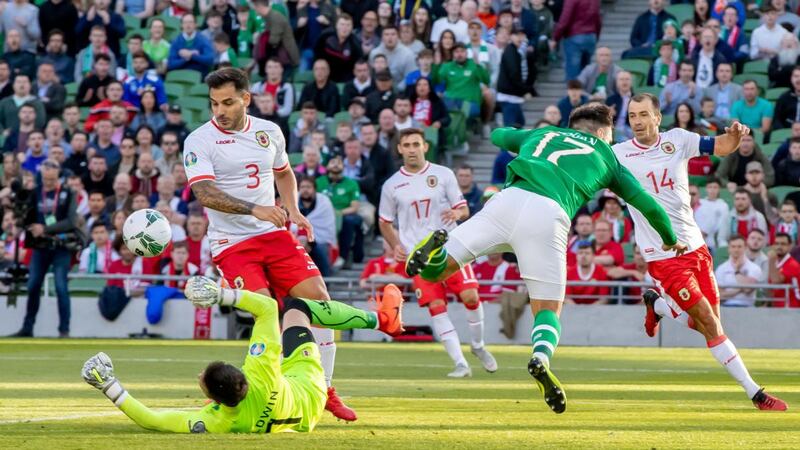 Ireland’s Scott Hogan collides with Gibraltar goalkeeper Kyle Goldwin. Photo: Morgan Treacy