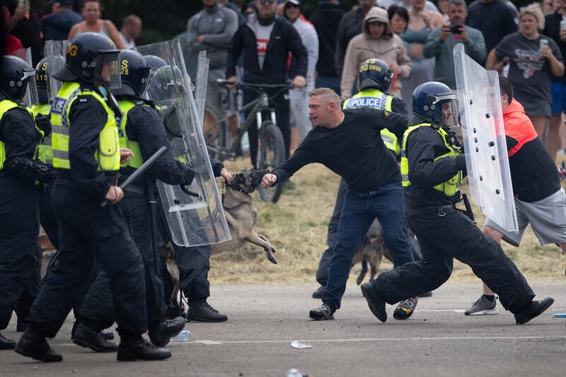 Police officers clash with rioters outside the Holiday Inn Express Hotel in Rotherham, which is housing asylum seekers, on August 4th. Photograph: Christopher Furlong/Getty Images