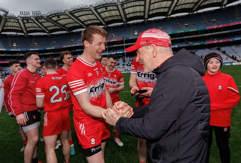Derry’s Brendan Rodgers celebrates winning the league Division 1 final at Croke Park with manager Mickey Harte. Photograph: James Crombie/Inpho