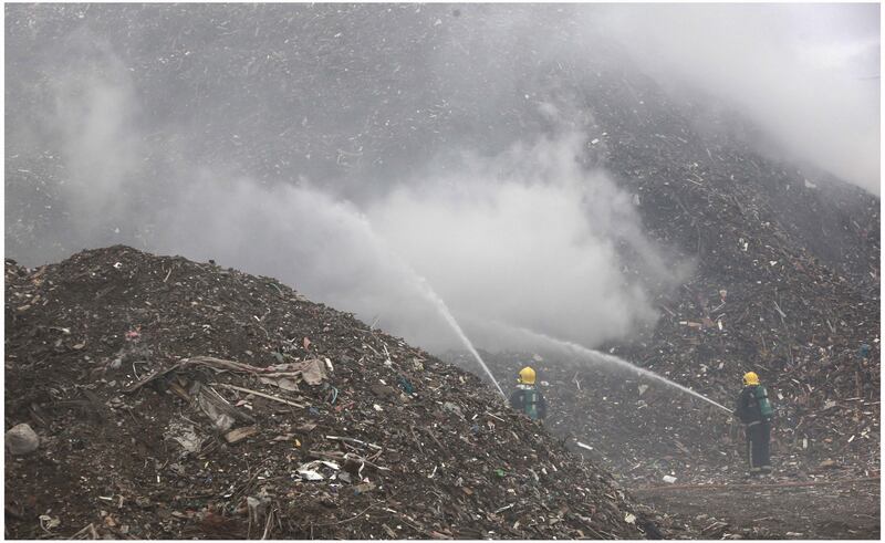 Firefighters attempt to control an underground fire at the landfill site, Kerdiffstown, near Naas, Co Kildare in 2011. The HSE was called in to monitor air quality polluted by the toxic smoke. File photograph: Brenda Fitzsimons/The Irish Times